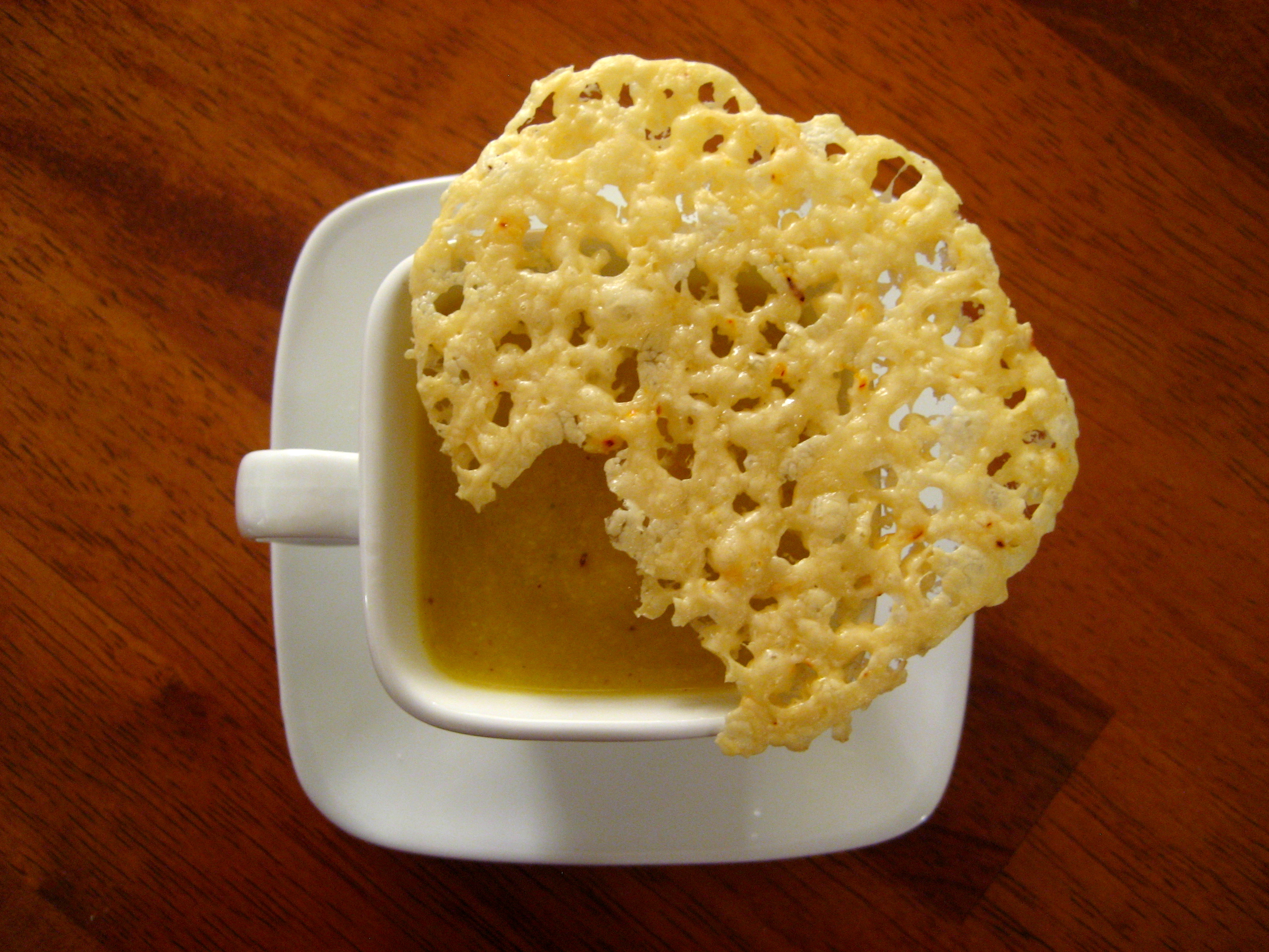 Orange Cauliflower and Fuji Apple Soup with Sage Cream and Aged Cheddar Tuiles