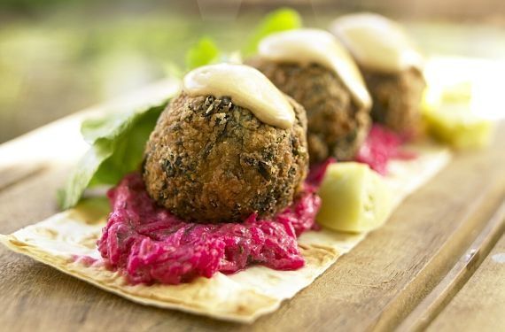 Oleana_s_falafel_atop_paper-thin_lavash_and_a_schmear_of_beet-spiked_yogurt