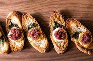 Toasted Goat Cheese Crostini with Basil and Red Onion Jam