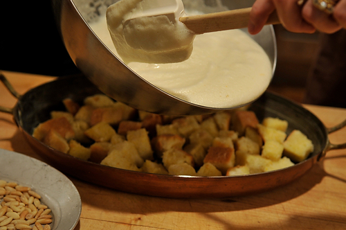 Airy Rosemary Citrus Pignole Bread Pudding