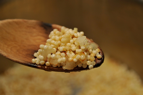 Israeli Couscous with Roasted Lemons & Capers topped with Seared Scallops & a Lemon Creme Fraiche Drizzle