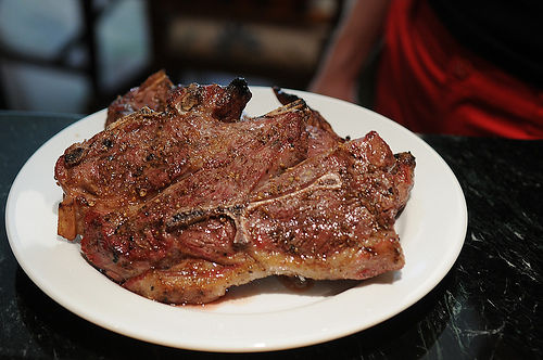 Grilled Blade Chops over Greek Salad