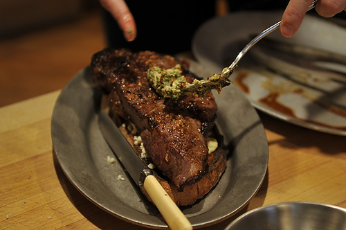 Broiled Spicy Steak with Garlic Chips on Gorgonzola Crostini