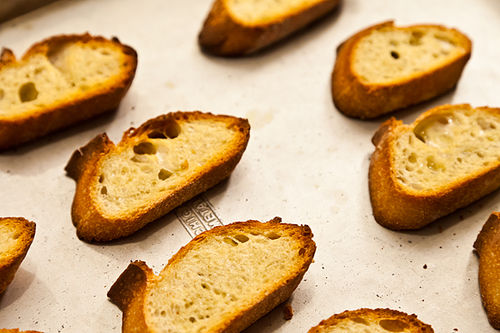 Ramped Up Crostini with Ricotta and Pea Shoots