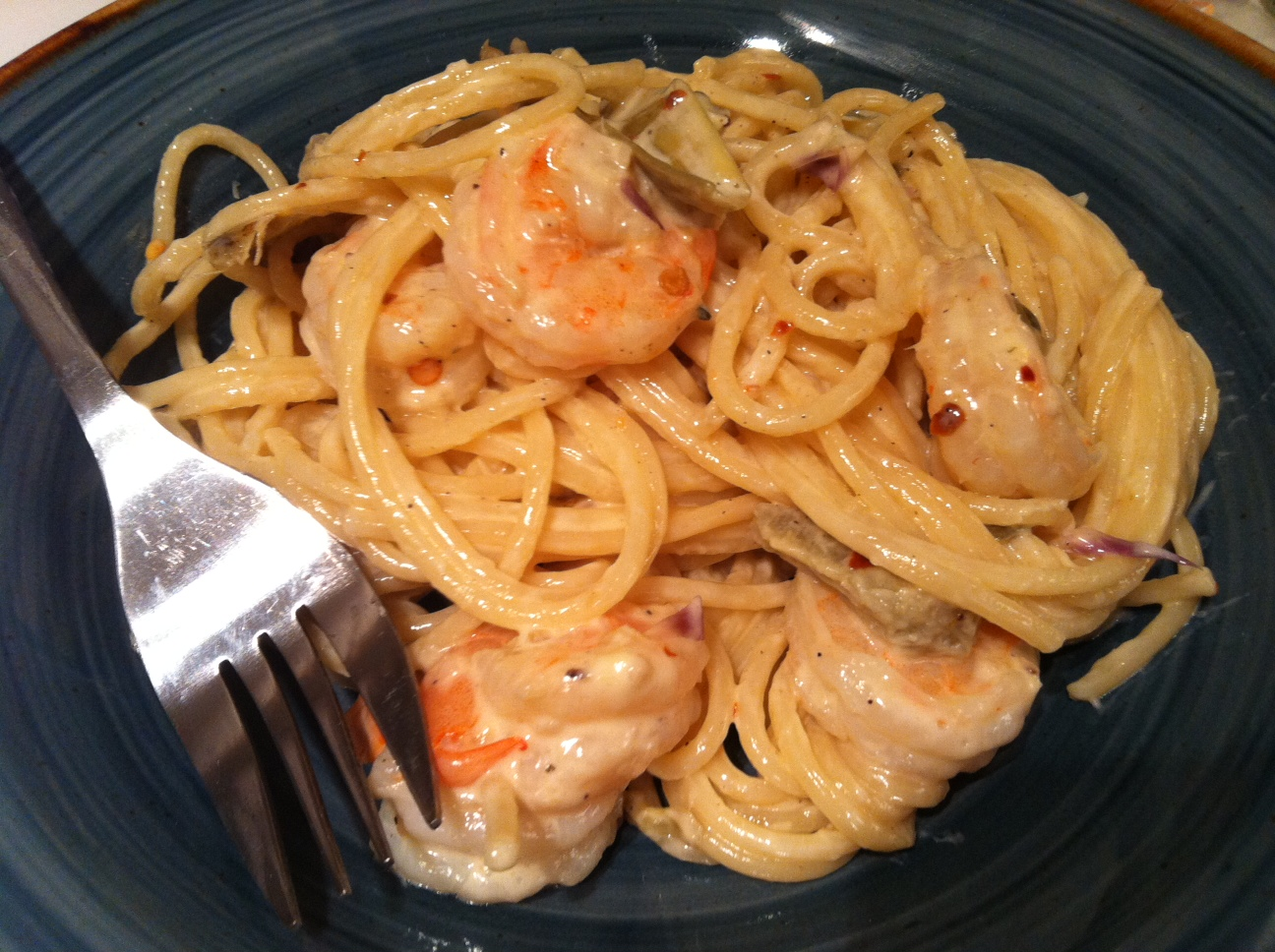 Garlic tarragon cream sauce in artichoke & shrimp pasta recipe on