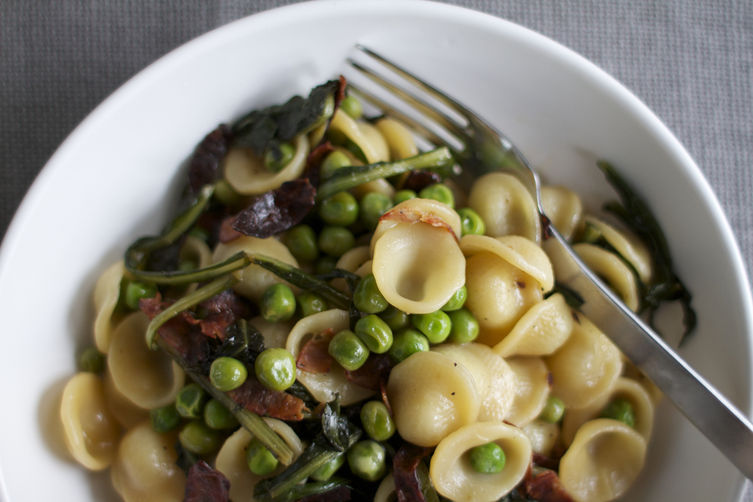 Orecchiette with Crispy Salami, Peas + Dandelion Greens
