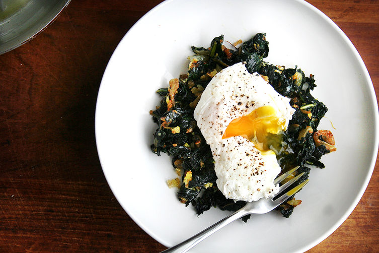 Slow-Cooked Tuscan Kale with Pancetta, Breadcrumbs, and a Poached Egg