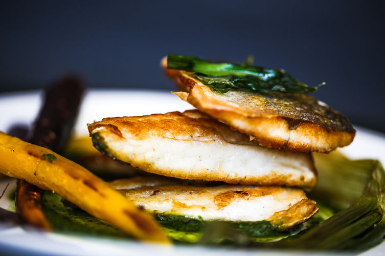PanFried Branzino with whole roasted scallions and purple potatoes