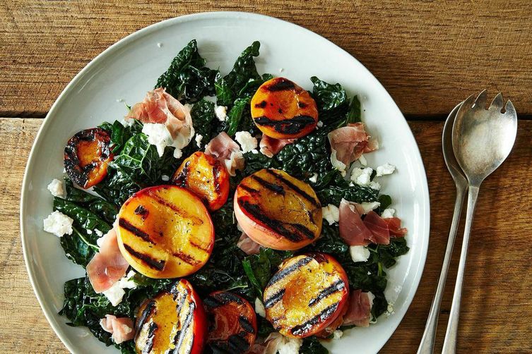 A Kale Salad with Grilled Stone Fruit, Prosciutto, and Feta