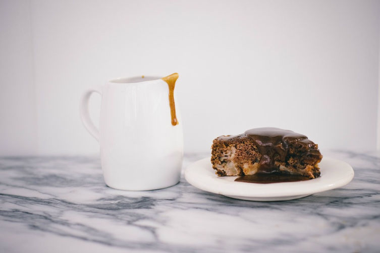 Booze Up Your Apple Cake with Rum Sauce