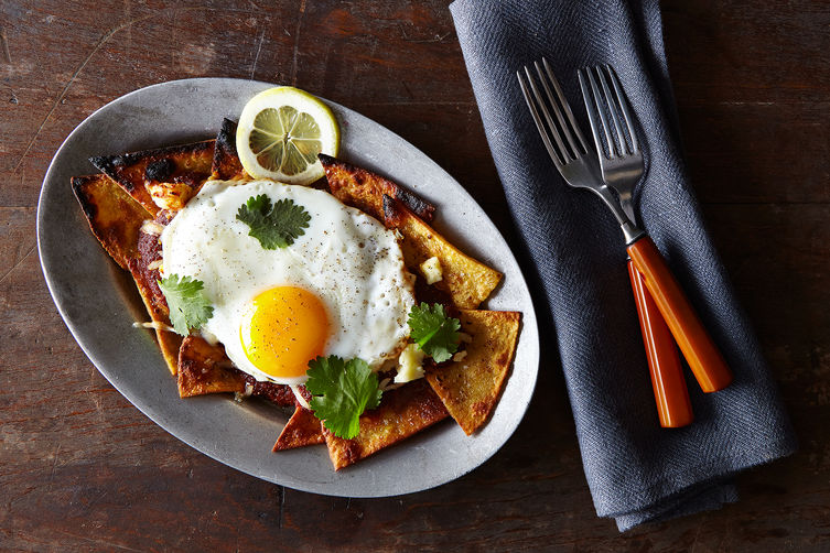 A Pile of Good, Better, and Best, Topped with a Fried Egg