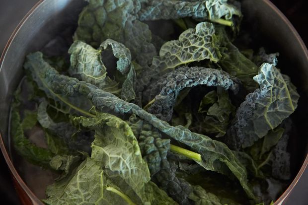 Slow-Cooked Tuscan Kale with Pancetta, Breadcrumbs, and a Poached Egg