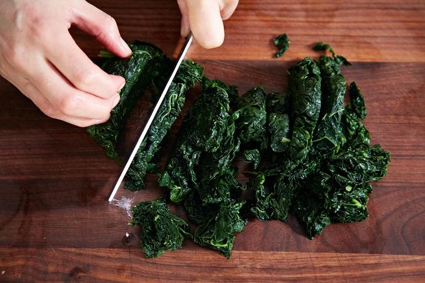 Slow-Cooked Tuscan Kale with Pancetta, Breadcrumbs, and a Poached Egg