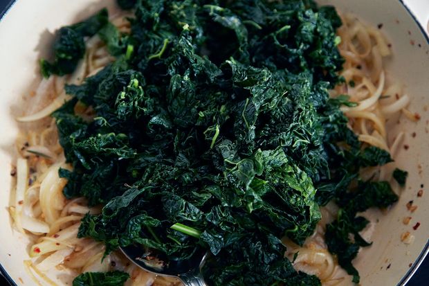 Slow-Cooked Tuscan Kale with Pancetta, Breadcrumbs, and a Poached Egg