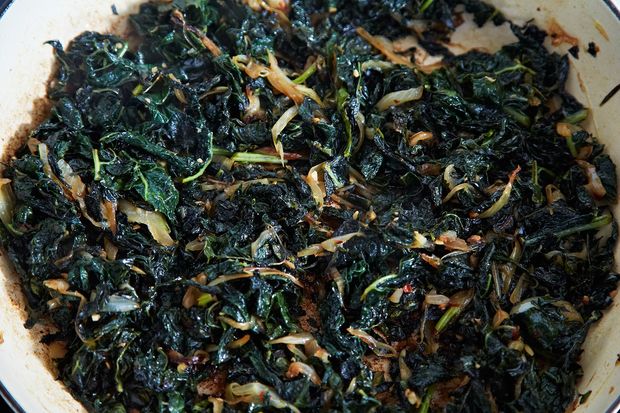 Slow-Cooked Tuscan Kale with Pancetta, Breadcrumbs, and a Poached Egg